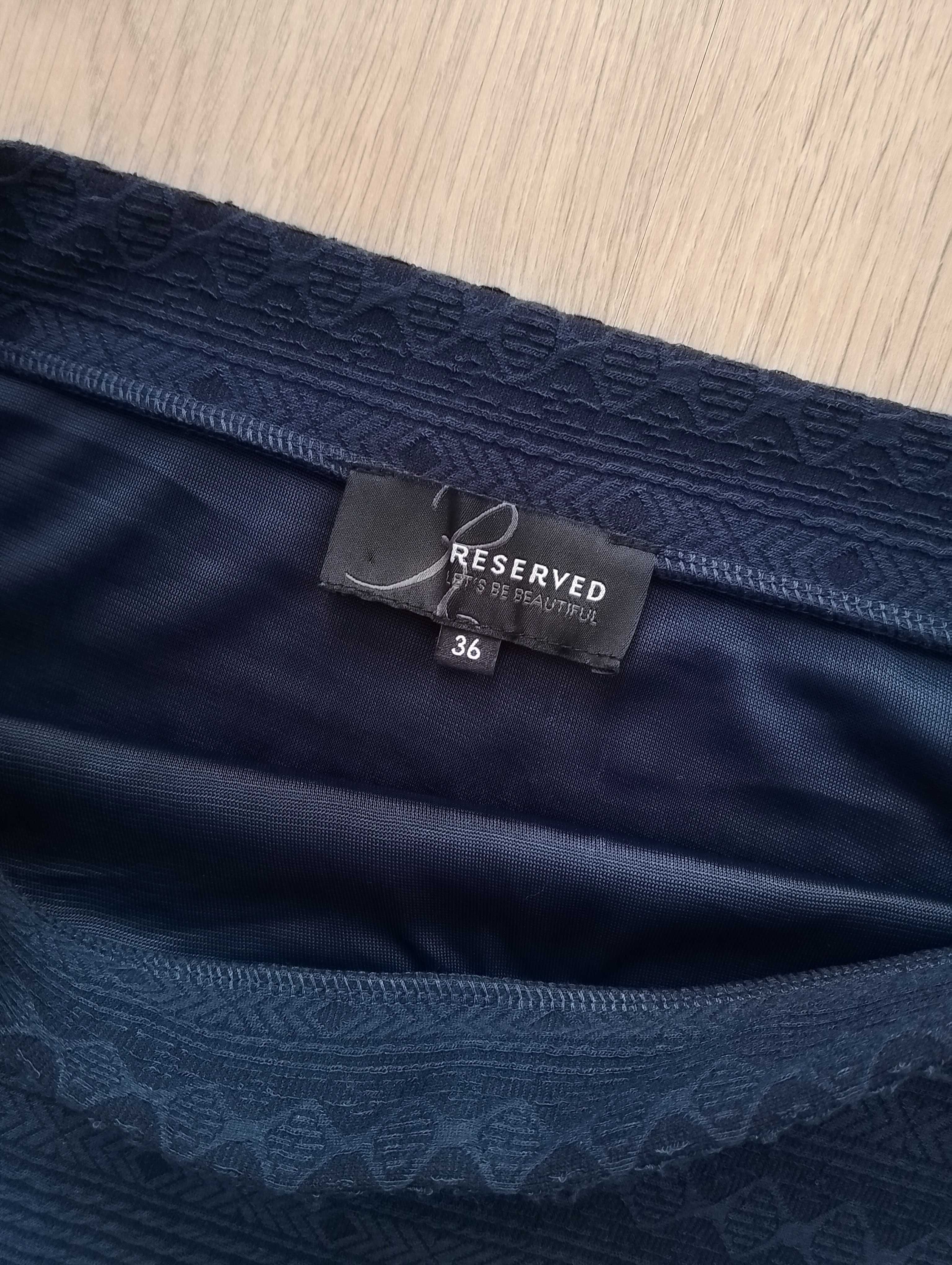 Reserved granatowa spódnica midi we wzór 34 XS