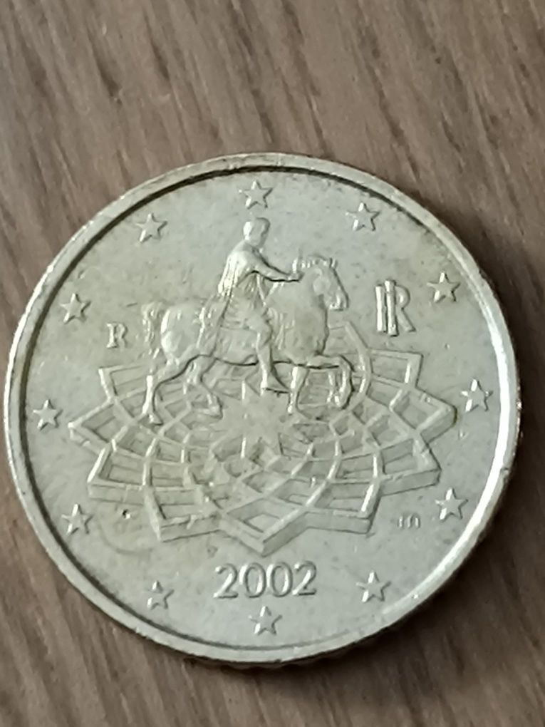 Moedas de 2002 de 1€ da Eslováquia e de 2009 de 0,50€ da Itália