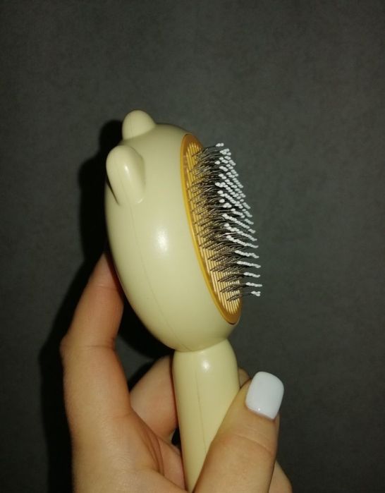 Пуходерка с кнопкой для вычесывания