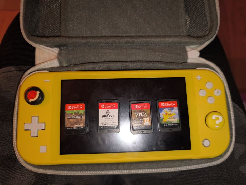 Nintendo switch lite + 4 jogos