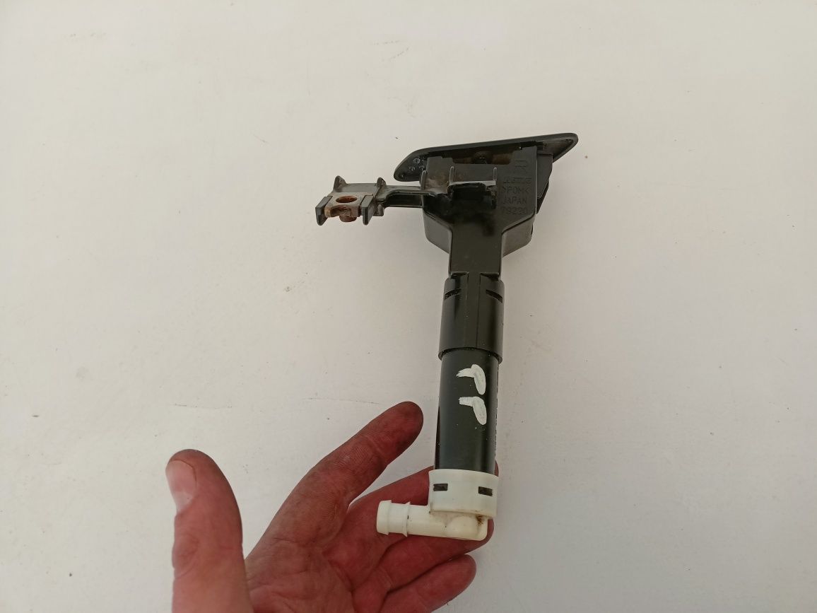 Toyota RAV4 III 3 lift FL 08-10 spryskiwacz sprysk prawy przód lampy