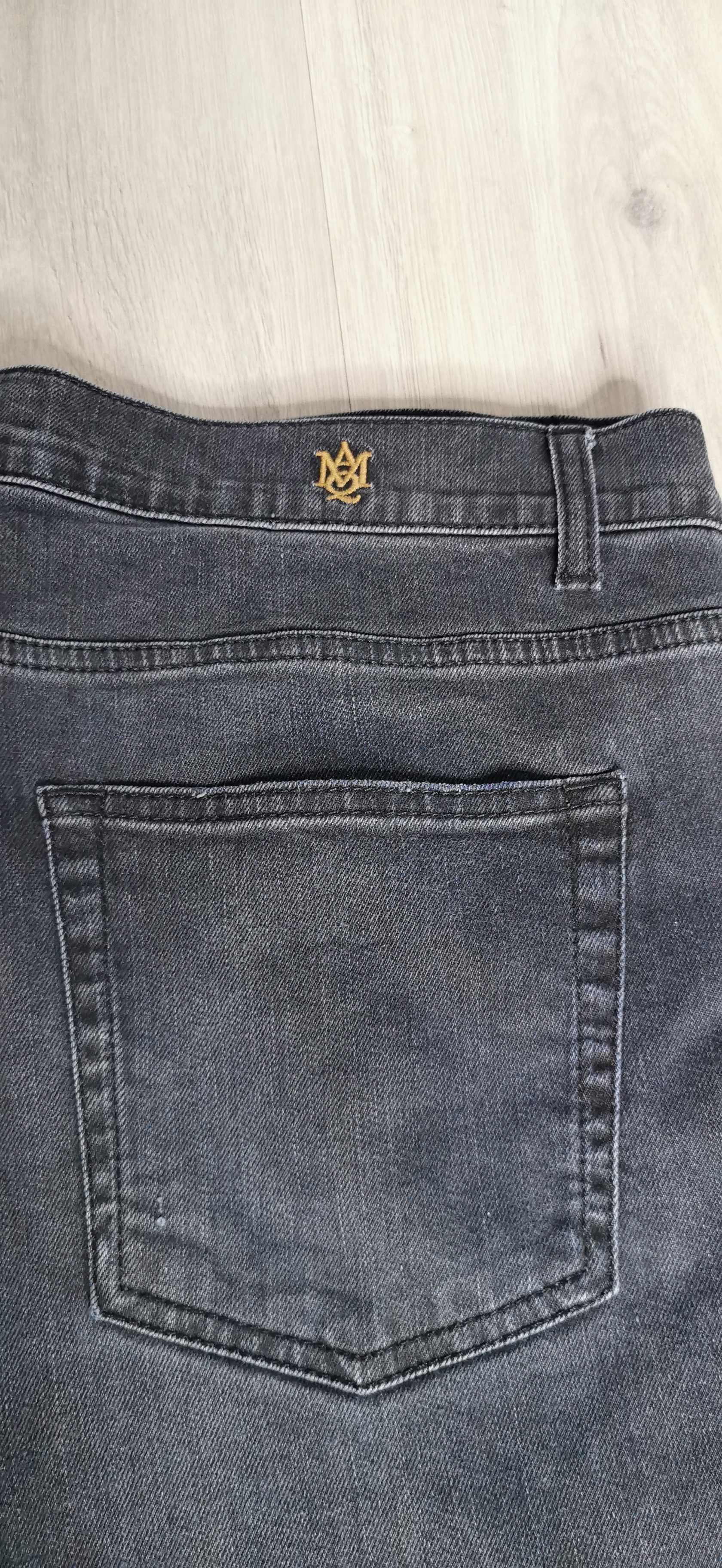 Spodnie jeansy z dziurami Alexander McQueen rozmiar XXL 2XL