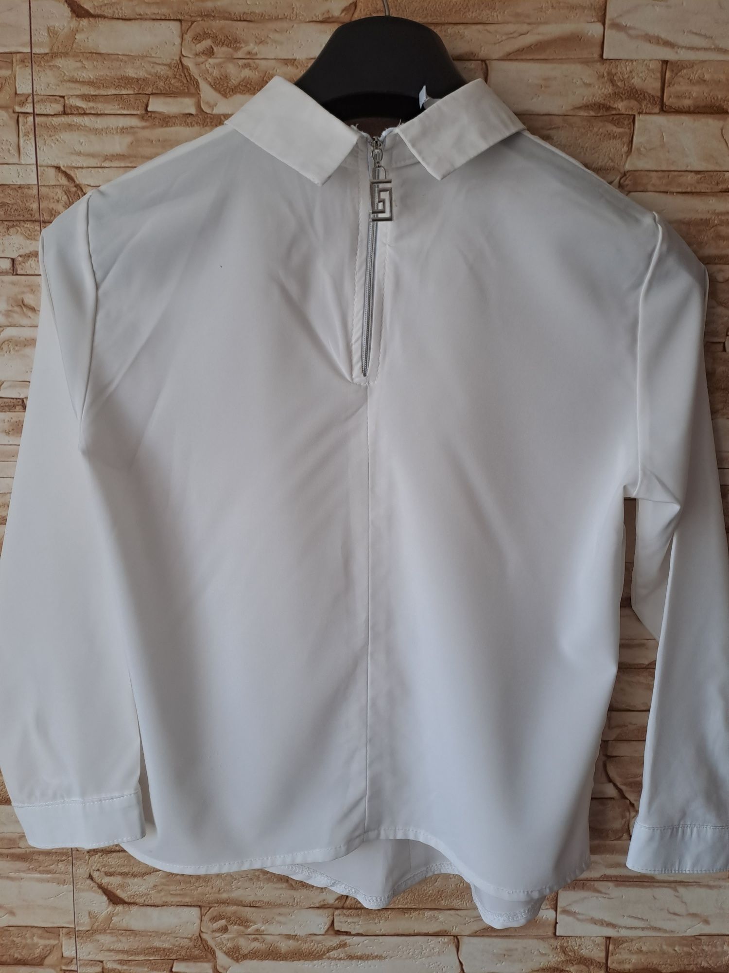 Блузка 42-44 розмір, молочного кольору, б/в, стан нової