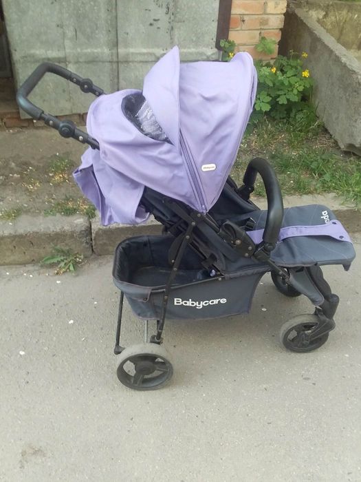 Дитяча прогулянкова коляска