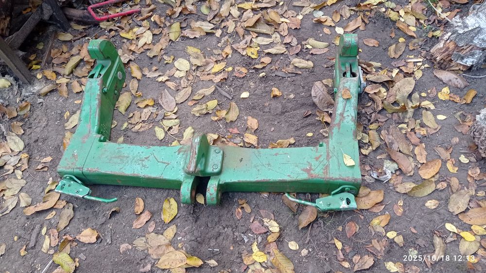 Швидкозчіпний пристрій John Deere