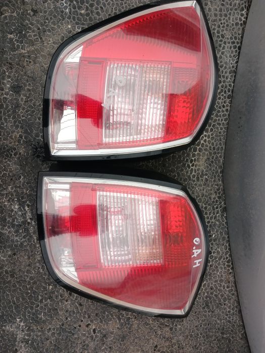 Задні ліхтарі стопи Opel adtra h унівепсал