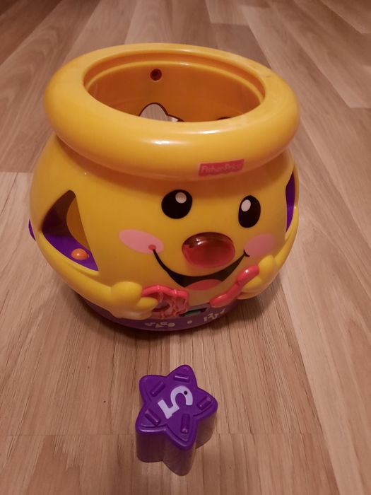 Grajacy garnuszek Fisher Price