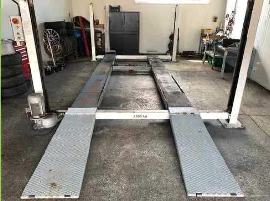 Podnośnik samochodowy warsztatowy czterokolumnowy 3,5T do geometrii