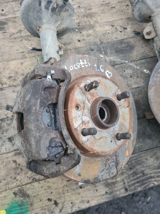 Передні стойки амортизатор супорт ступиця цапфа Chevrolet Lacetti 1.6