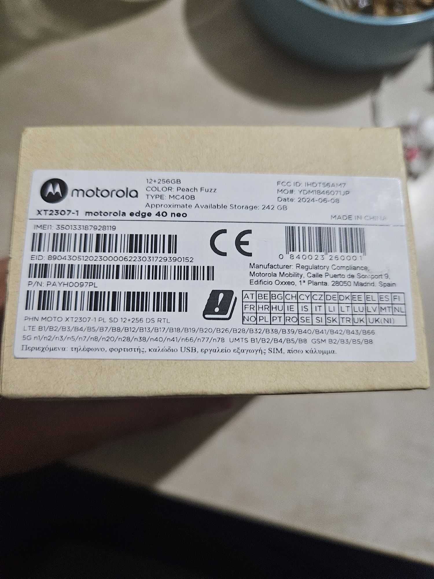 Motorola edge40 neo 12/256 колір peach fuzz запакована в пломбах