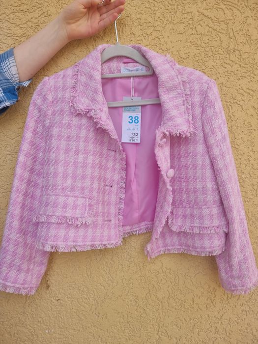 Твідовий жіночий костюм