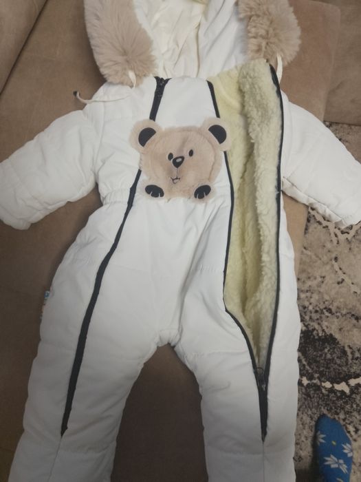 Зимові комбінезони