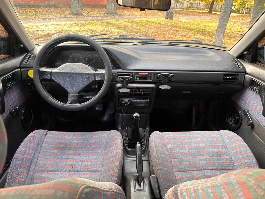 Mazda 323 расход 7л/100км