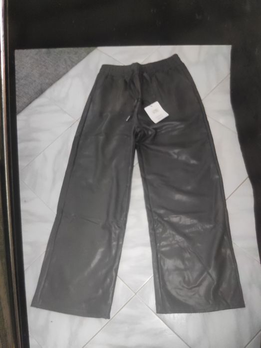 Calças pantalonas senhora novas