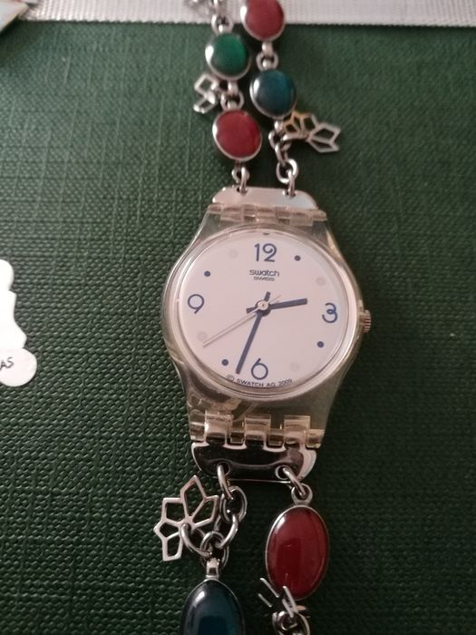 2 relógios de senhora swatch e festina