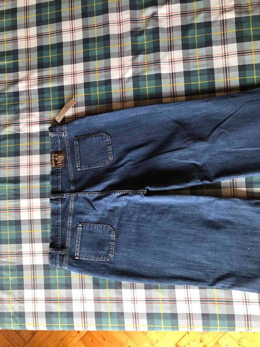 Новые джинсы широкие к низу клеш  Run&Fly размер 54-56.