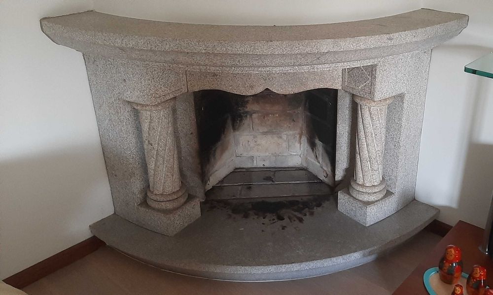 Lareira em granito para canto de sala