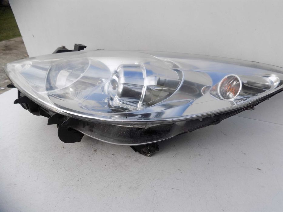 Reflektor lampa przód lewa Peugeot 307 lift 05-08 Europa soczewka