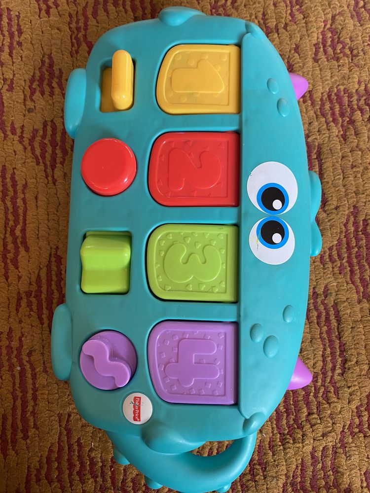 Fisher price піаніно монстрик