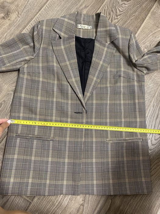 Костюм брючний в клітинку