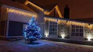 Украшение новогодними гирляндами, монтаж гирлянд, украшение домов