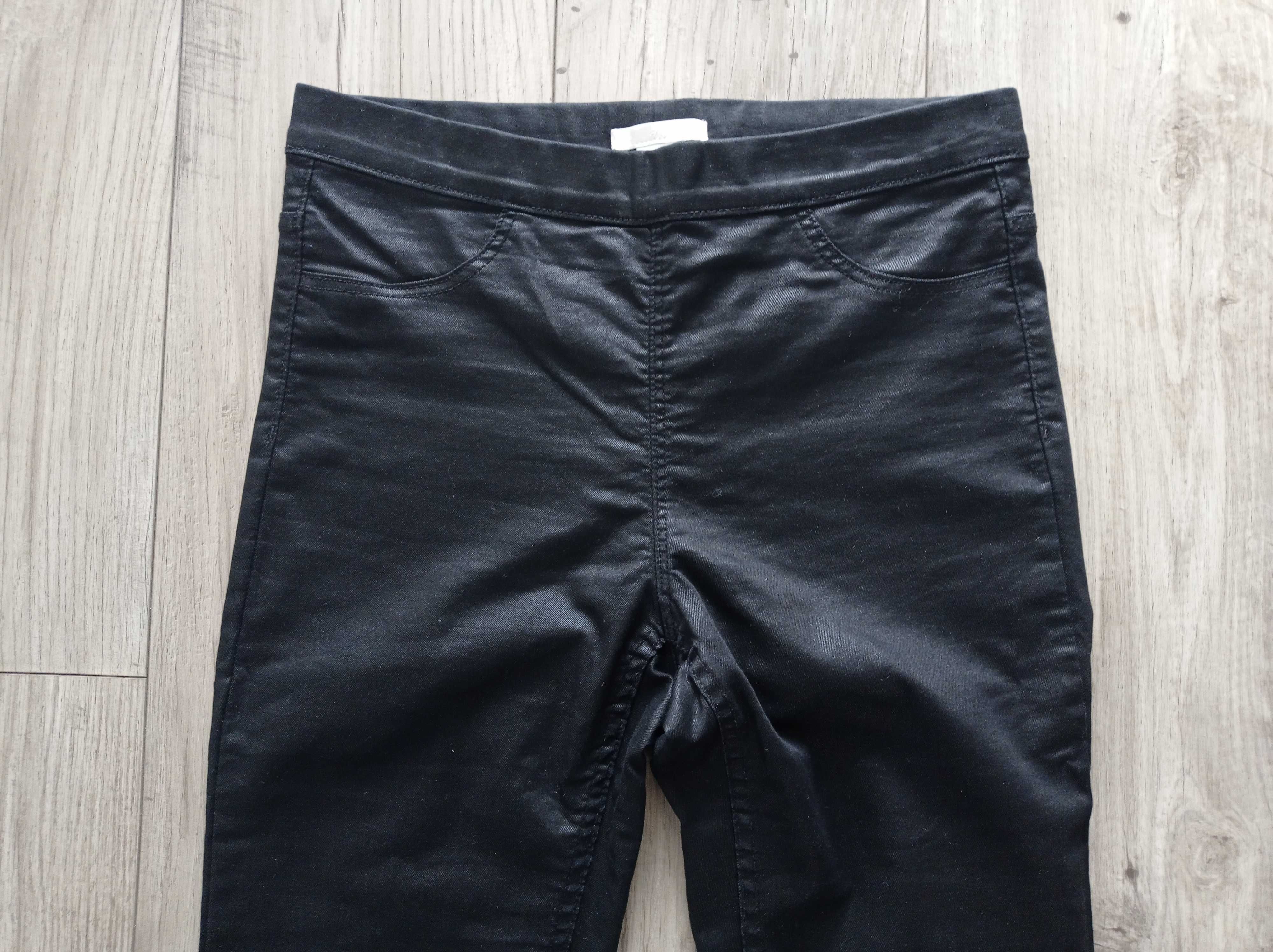 Spodnie jegginsy z połyskiem czarne H&M 36/S