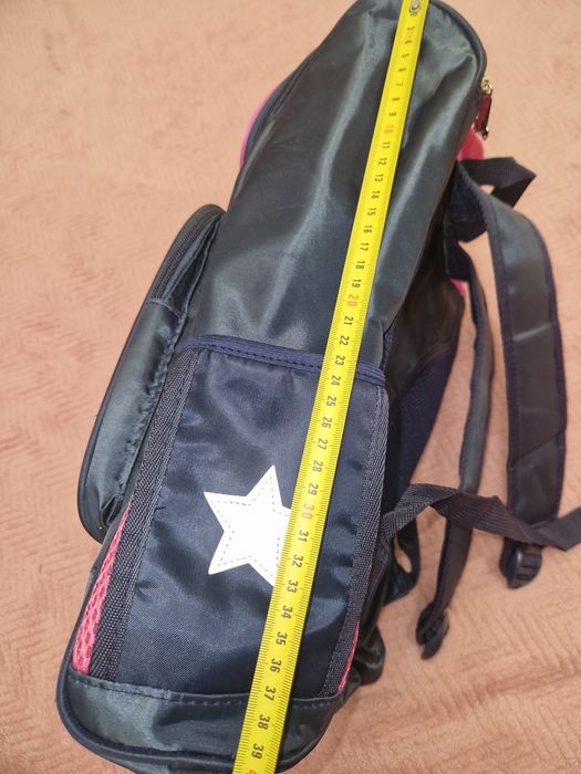 Новий портфель для дівчинки молодших класів