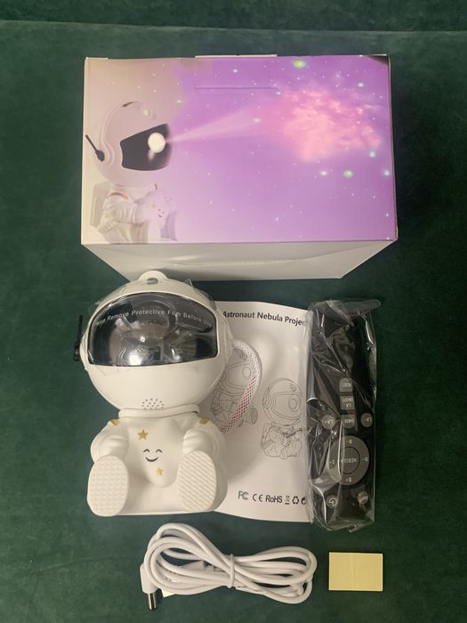Лазерний нічник проектор зоряного неба «Астронавт»  Космонавт СИДИТ