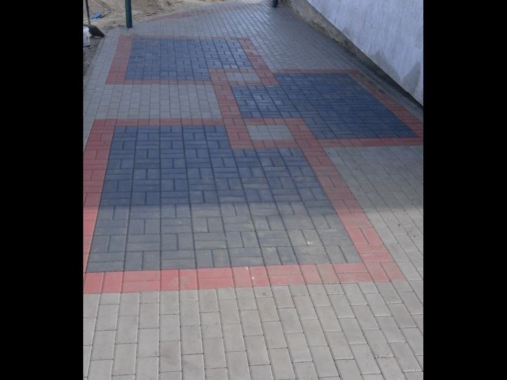 Usługi brukarskie, brukarz, kostka wokół pomnika, cmentarz .