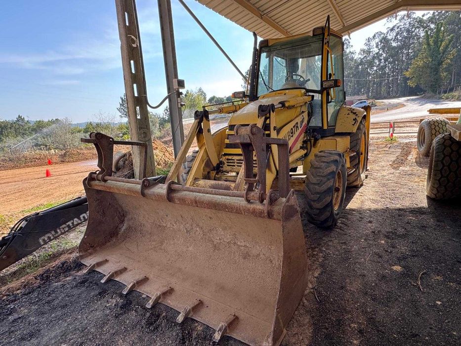 Retro Escavadora  Komatsu wb97r de Serviço