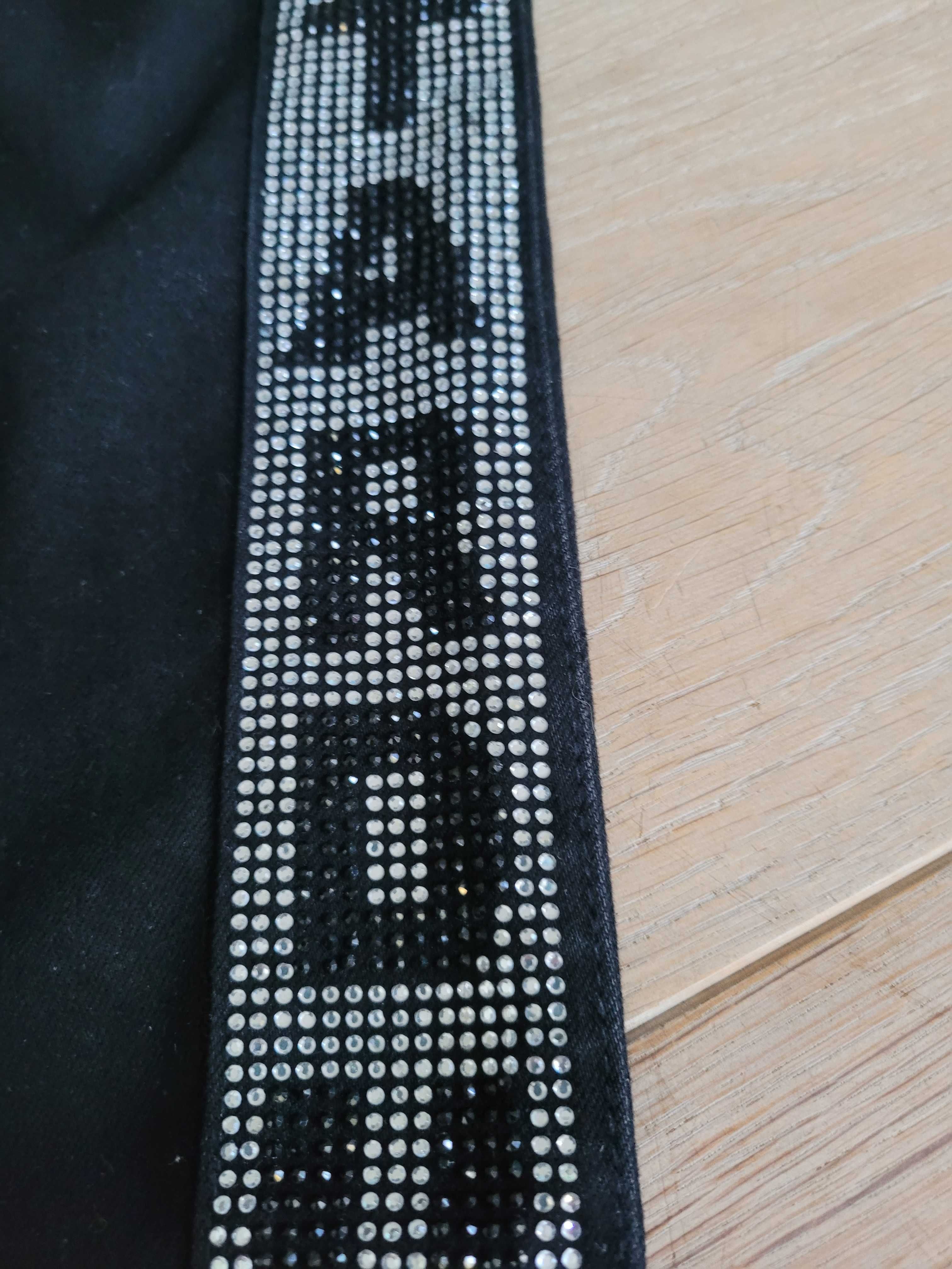 Spodnie czarne Reserved z błyszczącymi lampasami 146 cm