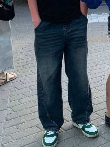 Dżinsy na szczupłego chłopca. Rozmiar 152-160