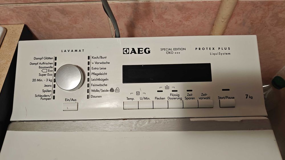 Стиральная машина AEG 7 кг вертикальная