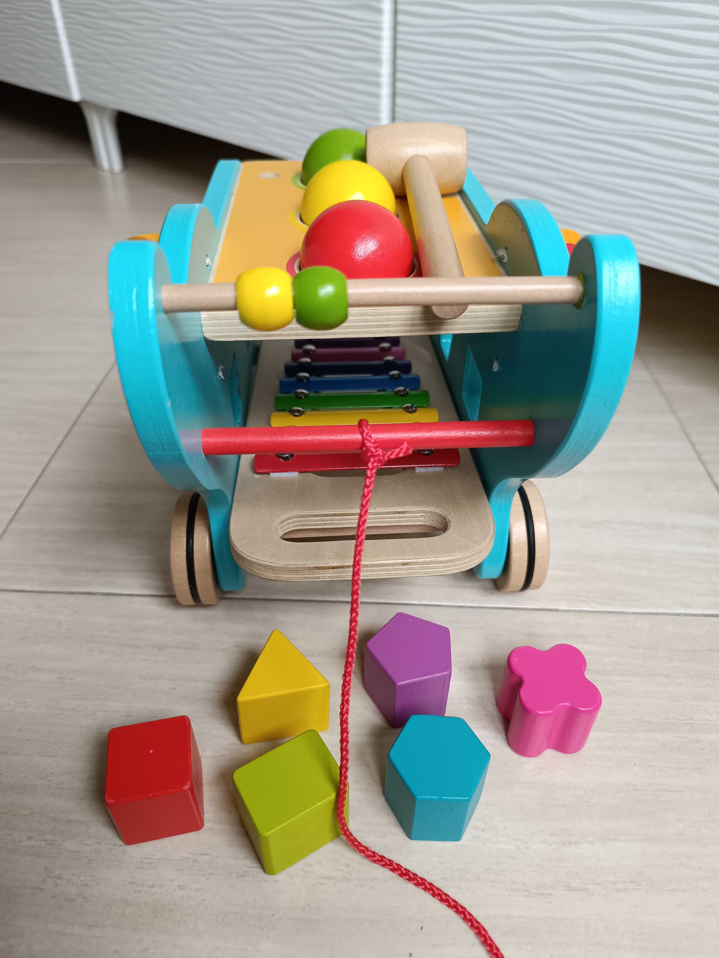 Brinquedo de puxar com actividades