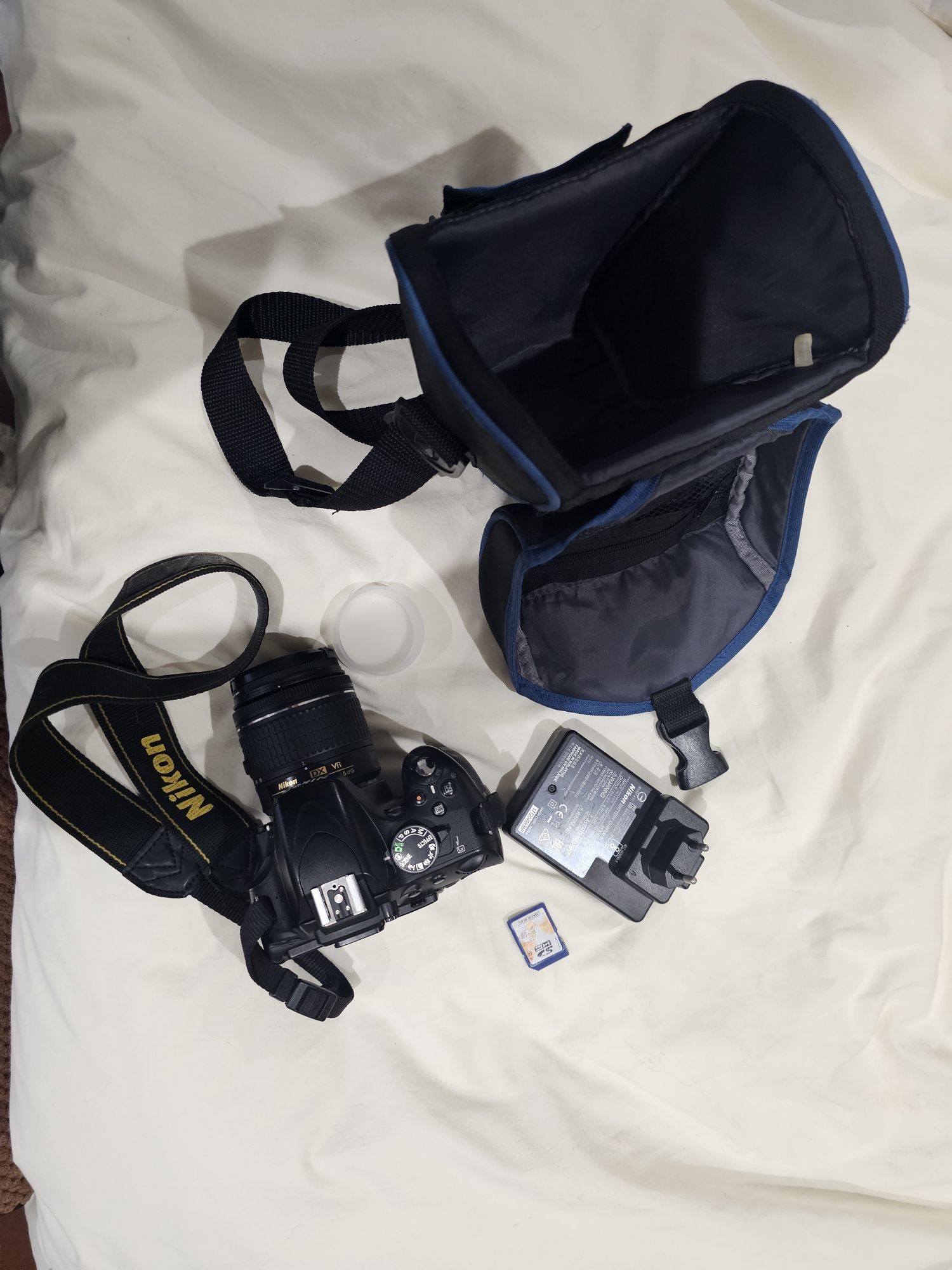 Câmara Digital Nikon D5100. Oferta cartão 4 GB