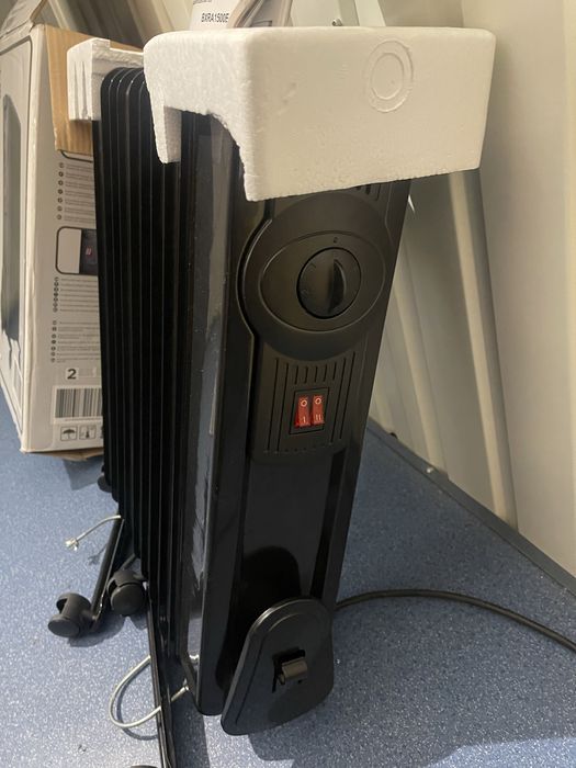 Aquecedor a oleo como novo na caixa