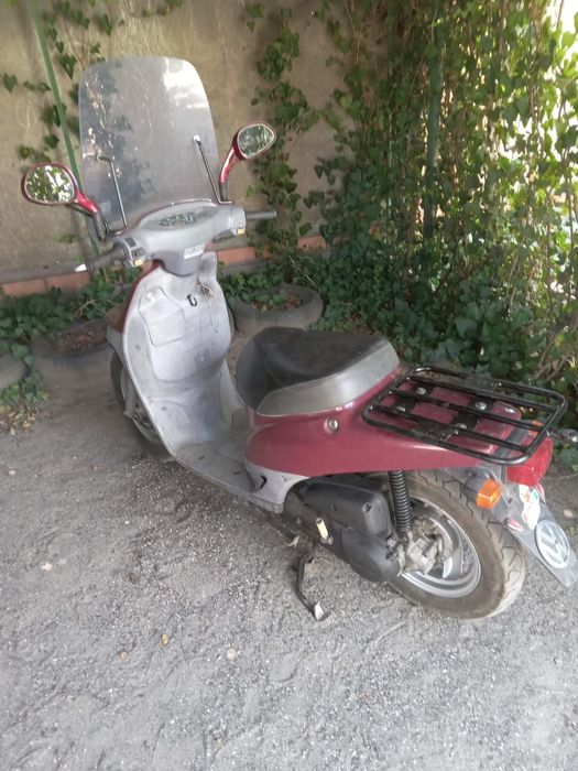 Продам скутер Ноnda  Topik, на ходу. С прицепом