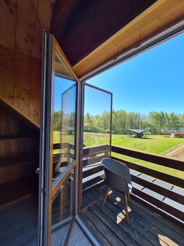 Spokoje- Noclegi nad jeziorem Apartament,plaża,łódki,balia