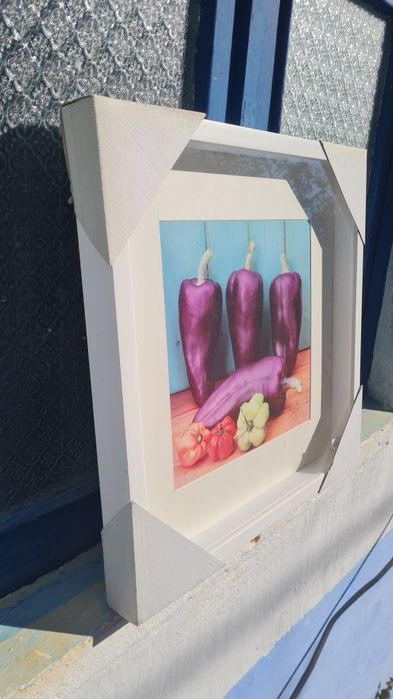 Quadro decorativo com moldura de alta qualidade.