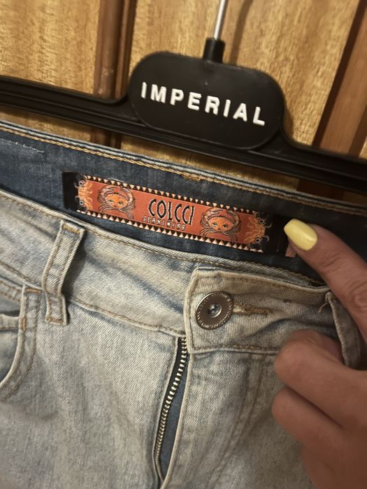 Calças Colcci de ganga elásticas,com recortes dos lados,como novas,36