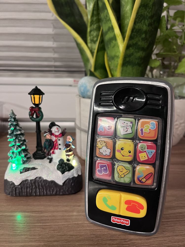 Telefon zabawka Fisher Price śpiewa liczy