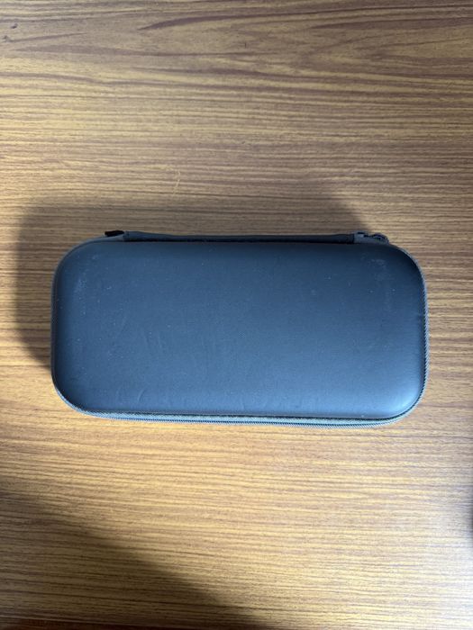 Nintendo Switch Lite + Jogos e Acessórios (como nova)