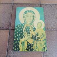 Stary obraz religijny namalowany na sklejce Matka Boska.