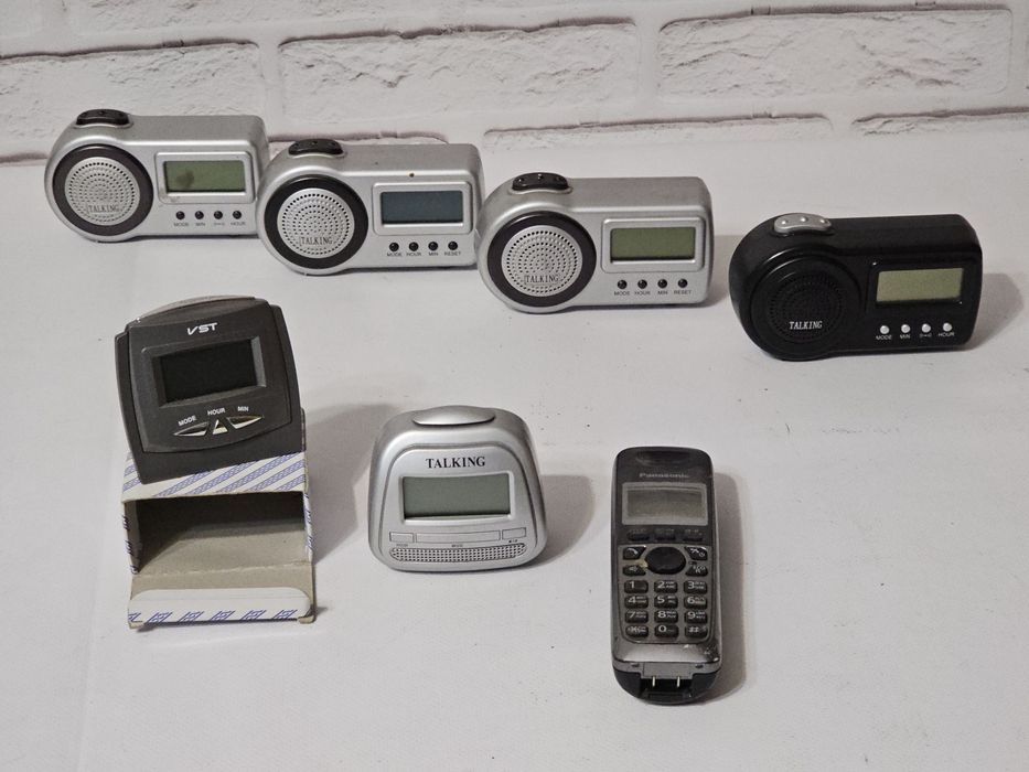 Продам говорящие часы и телефон