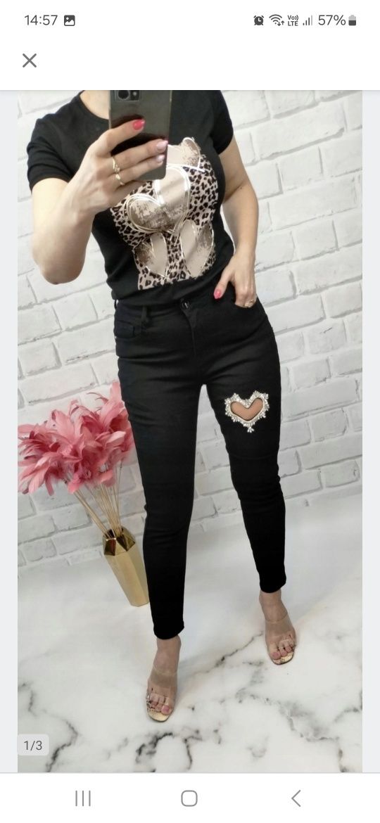 Czarne jeansy push up ze zdobieniem