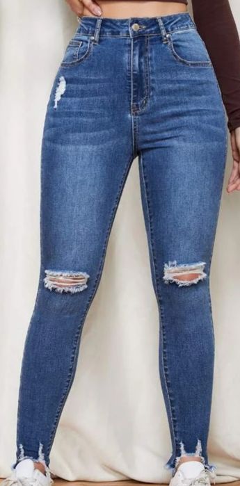 jeansy z dziurami