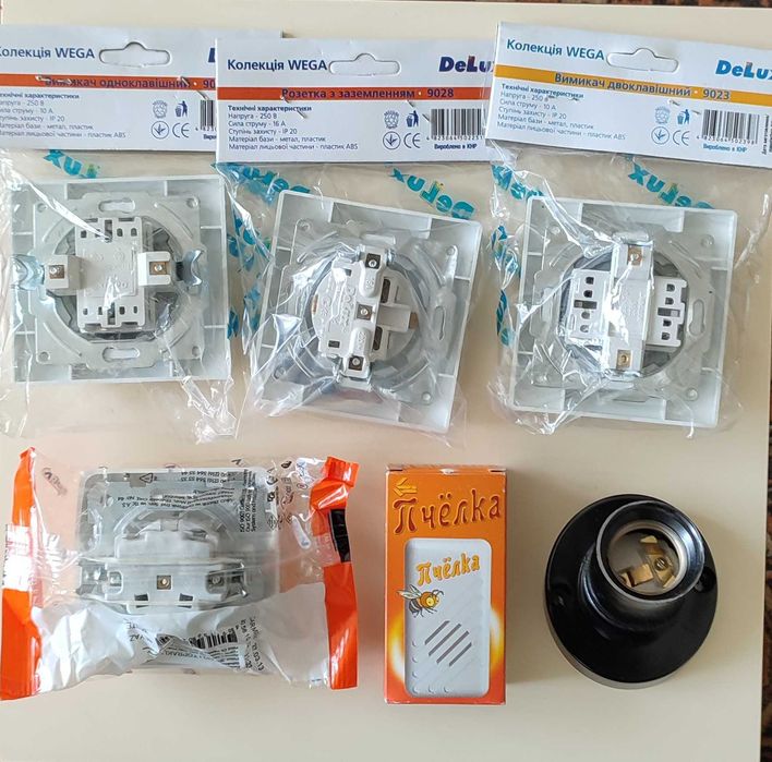 Розетки вимикачі DeLux