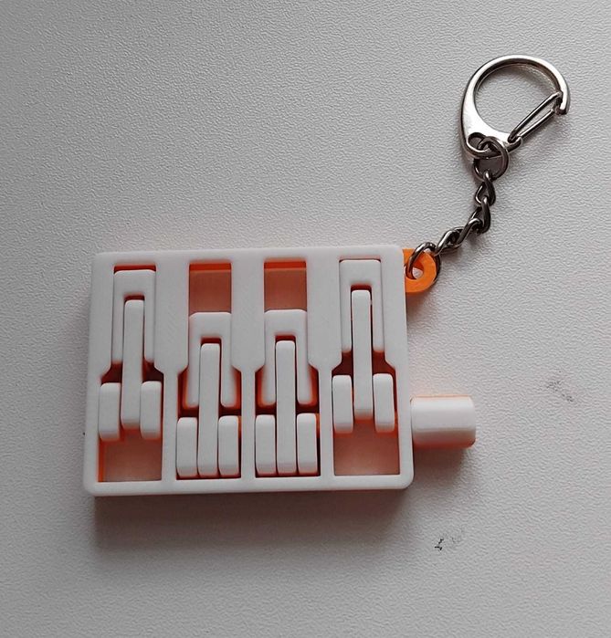 Рухливий брелок-антистрес “Міні-двигун”