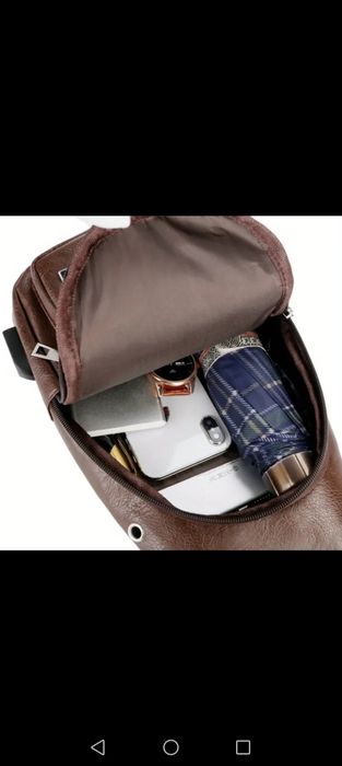 Сумка (барсетка) чоловіча темно-коричневого кольору.