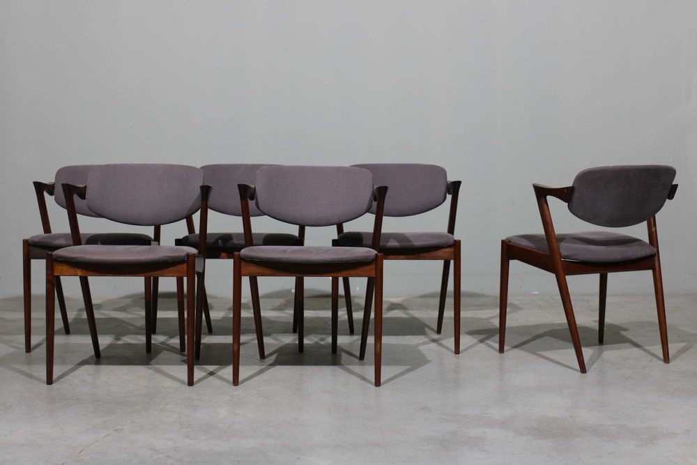 Conjunto de 6 cadeiras Kai Kristiansen modelo 42 em pau santo